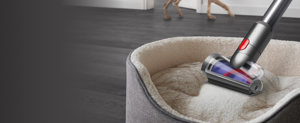 Hair screw tool cleaning a pet bed