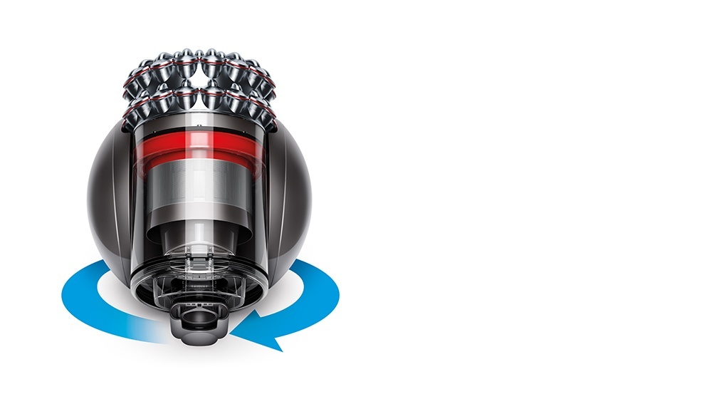 A Dyson Ball™ cylinder vacuum turning on the spot.