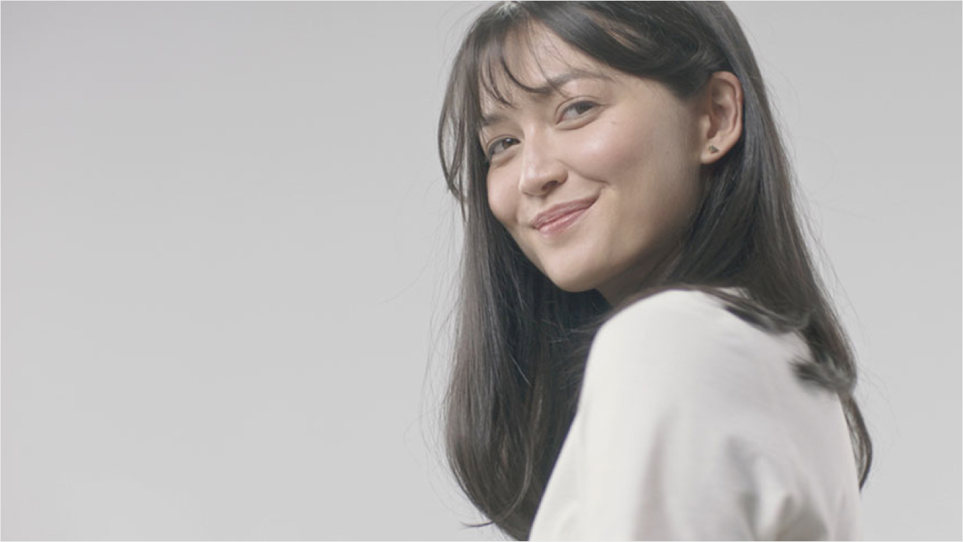 Model wearing a c-curl style