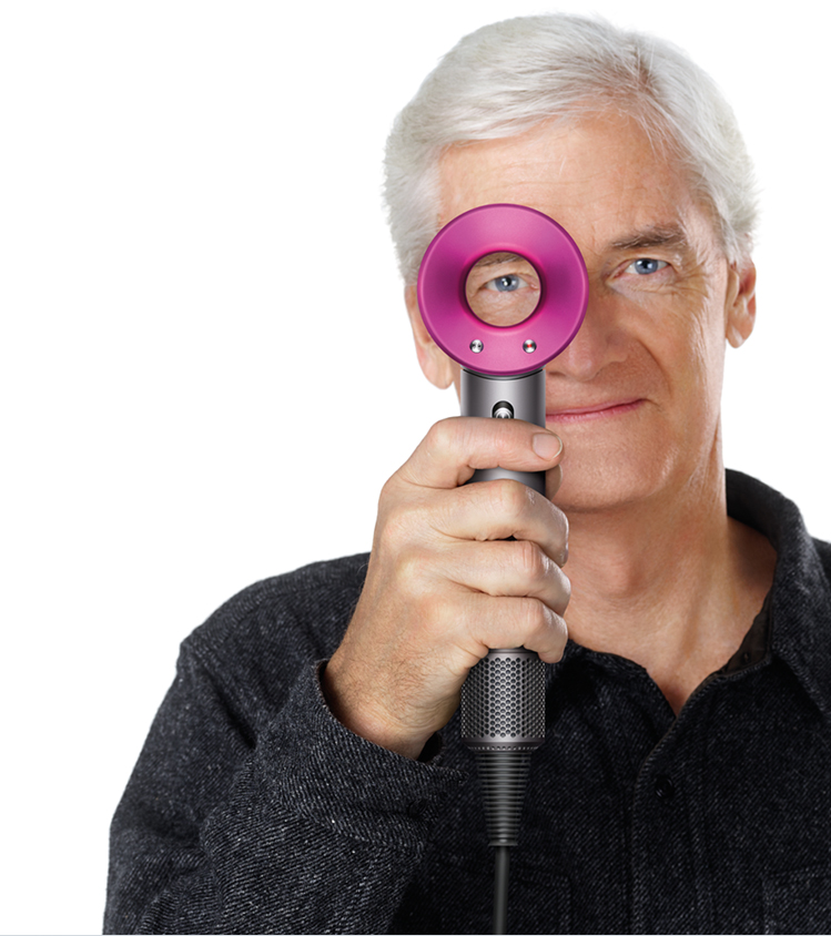 James Dyson holding the Dyson Supersoni&trade; hair dryer